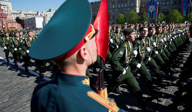 Russian soldiers march in a Victory Day Parade, which commemorates the 1945 defeat of Germany. (Associated Press)