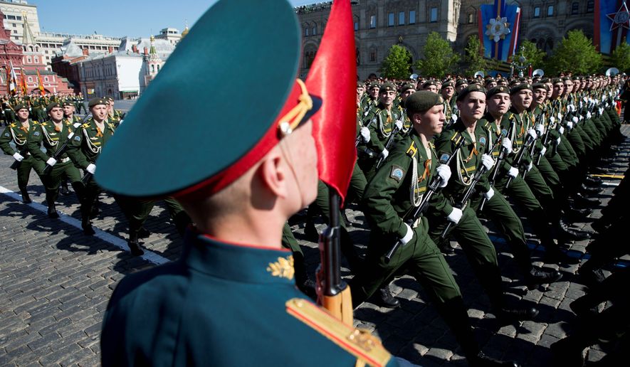 Russian soldiers march in a Victory Day Parade, which commemorates the 1945 defeat of Germany. (Associated Press)