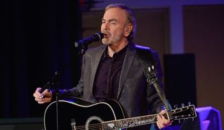 Neil Diamond performed for the first time in his hometown in Brooklyn last year, at his alma mater Erasmus Hall High School, to introduce his latest album, &quot;Melody Road.&quot; He says he isn&#39;t wasting precious time with his singing and songwriting talents. (Associated Press)