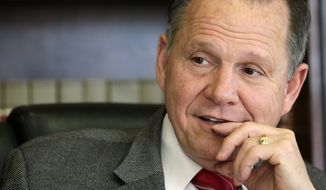 &quot;The U.S. district courts have no power or authority to redefine marriage,&quot; said Alabama Supreme Court Chief Justice Roy S. Moore. (Associated Press)