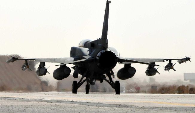 This photo released by WAM, the state news agency of the United Arab Emirates, shows an Emirati F-16 at an air base in Jordan, Tuesday, Feb. 10, 2015. The United Arab Emirates launched airstrikes Tuesday targeting the Islamic State group, its official news agency said, marking its return to combat operations against the militants after it halted flights late last year. (AP Photo/WAM)