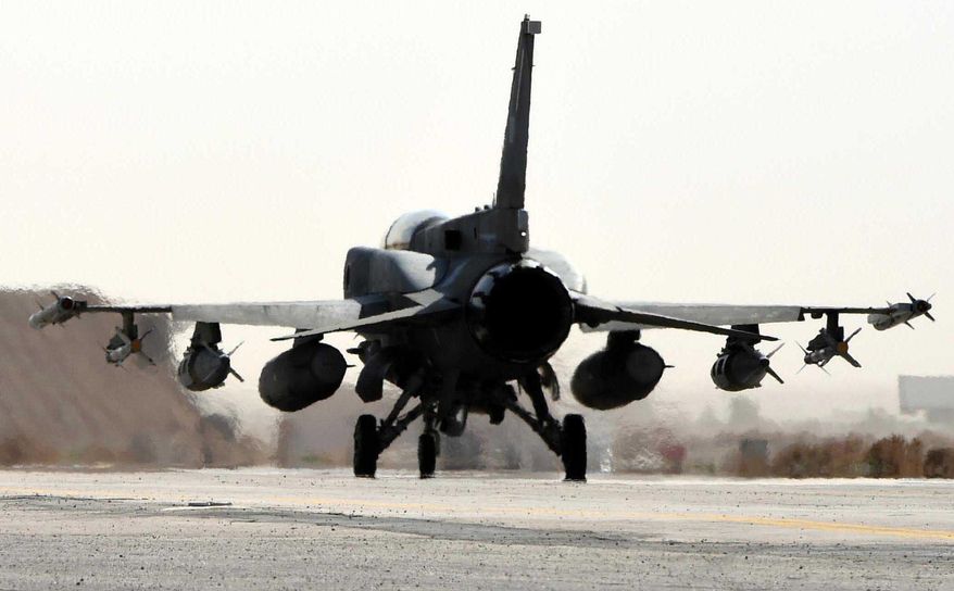 This photo released by WAM, the state news agency of the United Arab Emirates, shows an Emirati F-16 at an air base in Jordan, Tuesday, Feb. 10, 2015. The United Arab Emirates launched airstrikes Tuesday targeting the Islamic State group, its official news agency said, marking its return to combat operations against the militants after it halted flights late last year. (AP Photo/WAM)