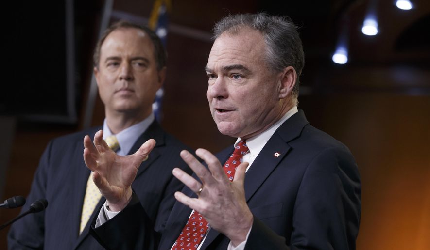 Sen. Tim Kaine, D-Va., right, accompanied by Rep. Adam Schiff, D-Calif., gestures during a news conference on Capitol Hill in Washington, Wednesday, Feb. 11, 2015, to reflect on President Barack Obama&#39;s request to Congress to authorize military force against Islamic State fighters, asking lawmakers to &amp;quot;show the world we are united in our resolve&amp;quot; to defeat militants who have overrun parts of the Middle East and threaten attacks on the U.S.  (AP Photo/J. Scott Applewhite)