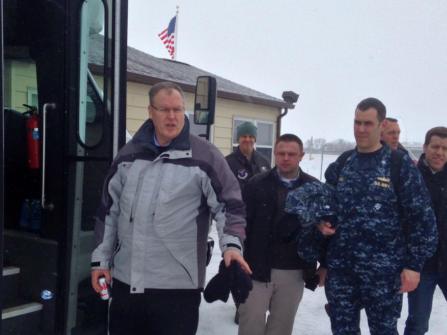 Deputy Defense Secretary Bob Work prepares to visit a nuclear ICBM launch control center in Minot, N.D., Wednesday Feb. 11, 2015, to check on progress in fixing the problems plaguing the force. Work is touring a nuclear missile base in one of his first steps toward fixing the problems The Associated Press revealed in the last 18 months. (AP Photo/Robert Burns)