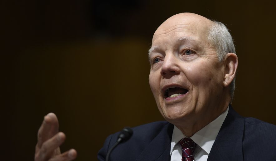 IRS Commissioner John Koskinen, testifying to the House oversight committee, said the White House never asked him or anyone else at the IRS about the potential tax effects of President Obama&#39;s amnesty policy. (Associated Press)