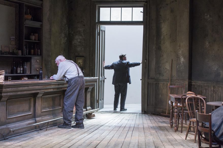 In this image released by Brooklyn Academy of Music, Brian Dennehy, left, and Nathan Lane appear in a scene from “The Iceman Cometh”, performing at the BAM Harvey Theater in the Brooklyn Borough of New York. (AP Photo/Brooklyn Academy of Music, Richard Termine)