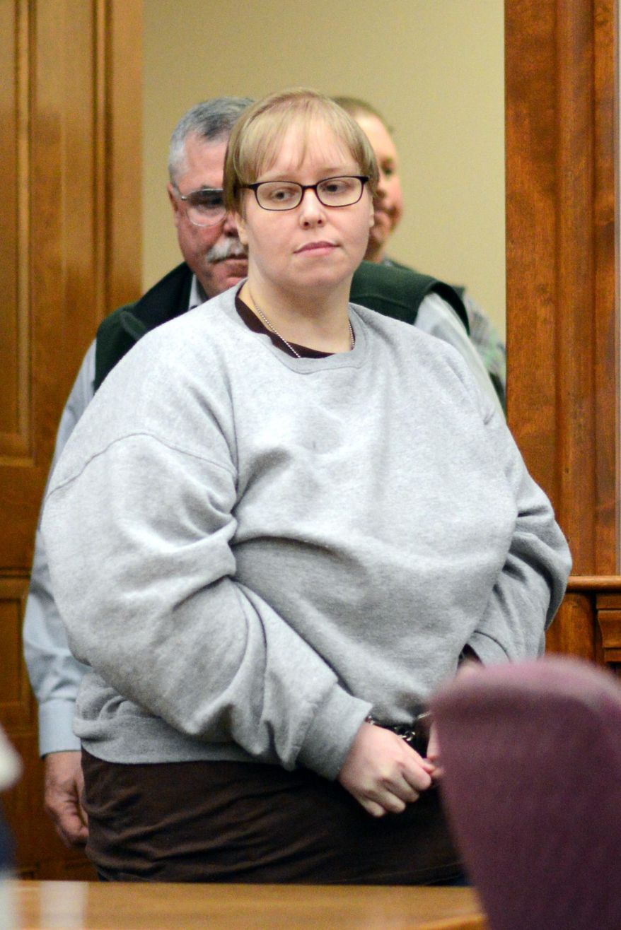 Patricia Prue is escorted into the courtroom for a change of plea hearing, Thursday, Feb. 12, 2015, in Caledonia Superior Court in St. Johnsbury, Vt. Abandoning any claims to an insanity defense, Prue pleaded guilty Thursday to the 2012 strangulation of a prep school teacher Melissa Jenkins, who prosecutors say was lured to her death with a ruse about a broken down car. (AP Photo/Caledonian-Record, Leah Carey)