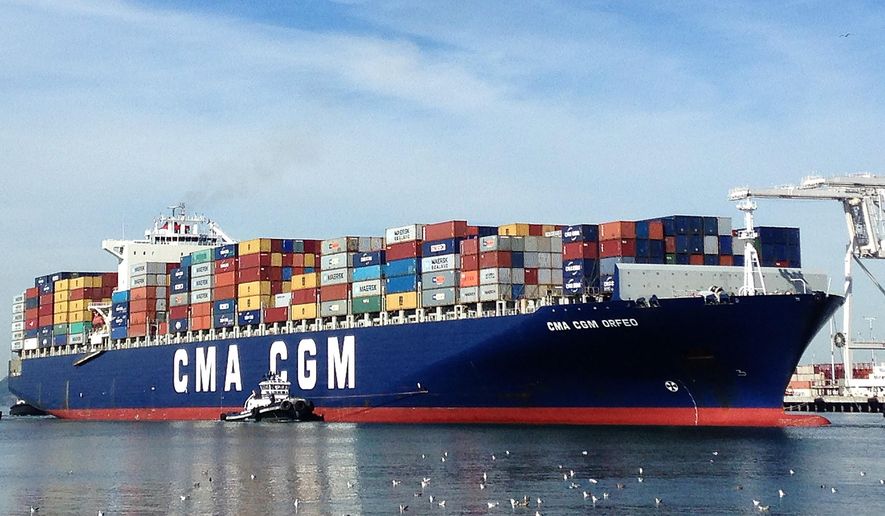 A container ship is guided by tugboats as it arrives at the Port of Oakland to be unloaded Thursday, Feb. 12, 2015, in Oakland, Calif. Companies that operate marine terminals didn't call workers to unload ships Thursday that carry car parts, furniture, clothing, electronics, just about anything made in Asia and destined for U.S. consumers. The partial lockout is the result of an increasingly damaging labor dispute between dockworkers and their employers. The two sides have been negotiating a new contract, and stalled talks have all but paralyzed 29 ports that handle about one-quarter of U.S. international trade, around $1 trillion worth of cargo annually. (AP Photo/Ben Margot)