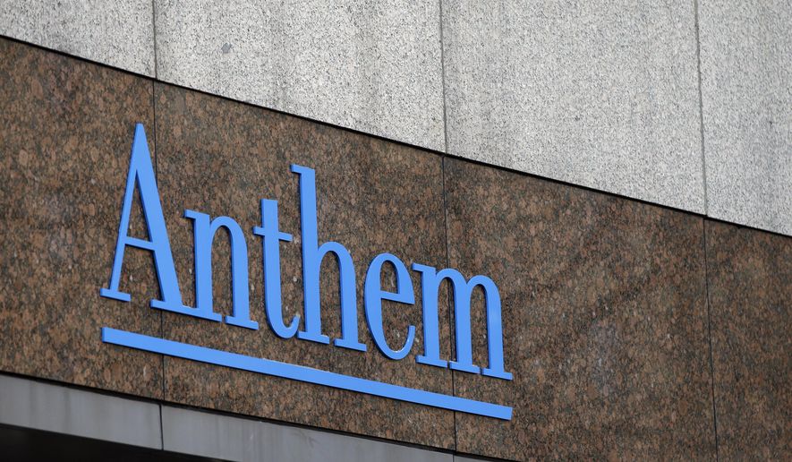 FILE - This Wednesday, Dec. 3, 2014, file photo, shows the Anthem logo at the company's corporate headquarters in Indianapolis. Anthem Inc., said Friday, Feb. 13, 2015, that it is offering several levels of free identity theft protection to current and former customers after hackers broke into a database storing information for about 80 million people. (AP Photo/Darron Cummings, File)