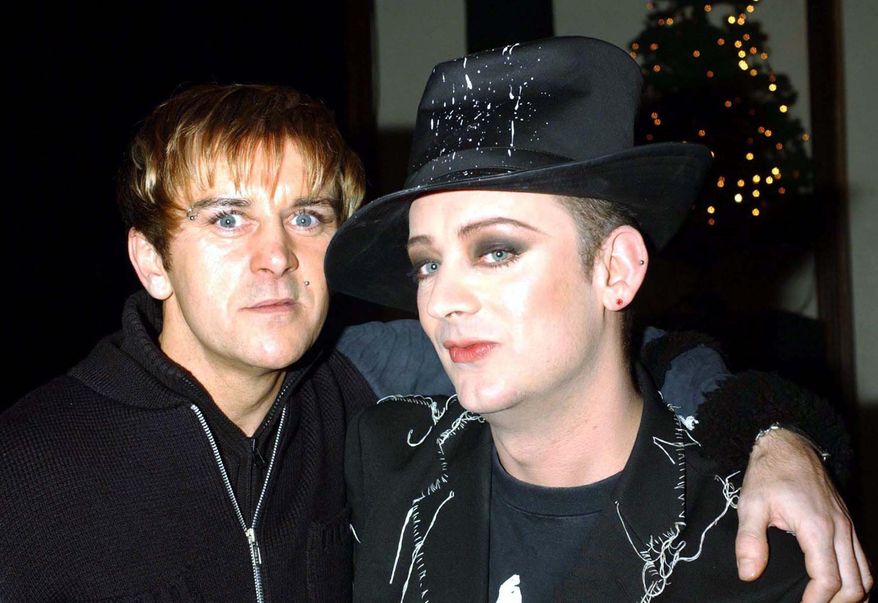 FILE - In this Dec. 14, 2001, file photo Steve Strange, left, and Boy George pose for a photo in London. Steve Strange, singer with British band Visage and one of the founders of the 1980s’ New Romantic style, has died. He was 55. Strange’s record label said he died Thursday in a hospital in the Egyptian Red Sea resort of Sharm-el-Sheik, of an apparent heart attack. (AP Photo/PA, Yui Mok) UNITED KINGDOM OUT