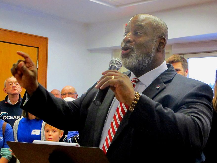 Jonathan Barfield Jr., chairman of the New Hanover County, N.C., Commissioners, speaks during a rally opposing drilling offshore of the Carolinas on Tuesday, Feb. 17, 2015, in Wrightsville Beach, N.C. The rally was held in a motel meeting room. Down the hall, the federal Bureau of Ocean and Energy Management was taking comments on what should be studied as it looks at opening tracts off the Atlantic coast to offshore drilling. (AP Photo/Bruce Smith)
