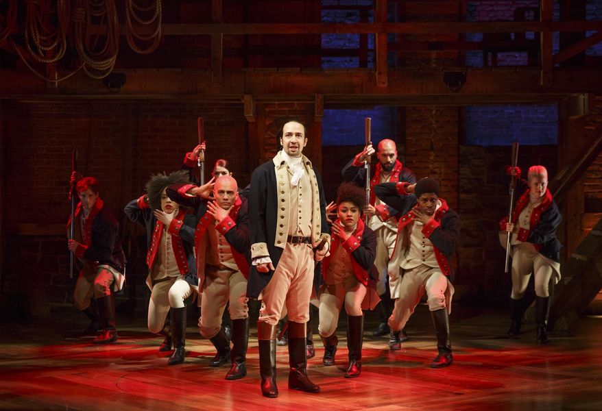 In this image released by The Public Theater, Lin-Manuel Miranda, center, performs in the musical "Hamilton" at The Public Theater in New York. (AP Photo/The Public Theater, Joan Marcus)