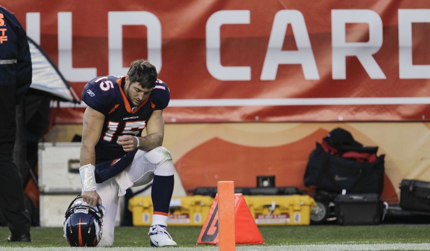 Denver Broncos quarterback Tim Tebow (15) prays on the sidelines during the third quarter of an NFL wild card playoff football game against the Pittsburgh Steelers, Sunday, Jan. 8, 2012, in Denver.  (AP Photo/Joe Mahoney)