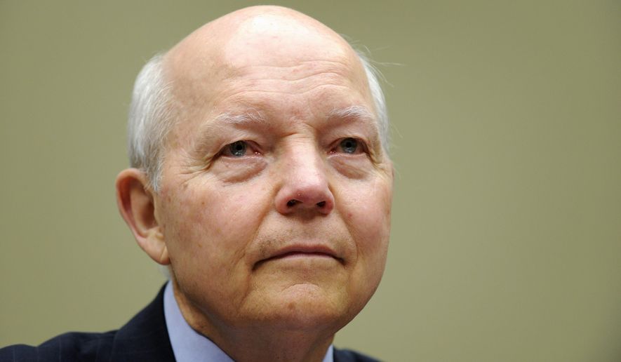 IRS Commissioner John Koskinen told Congress on Wednesday that he has had to take money away from answering phone calls and instead spend it on technology and personnel to carry out President Obama&#39;s health care law. (Associated Press)