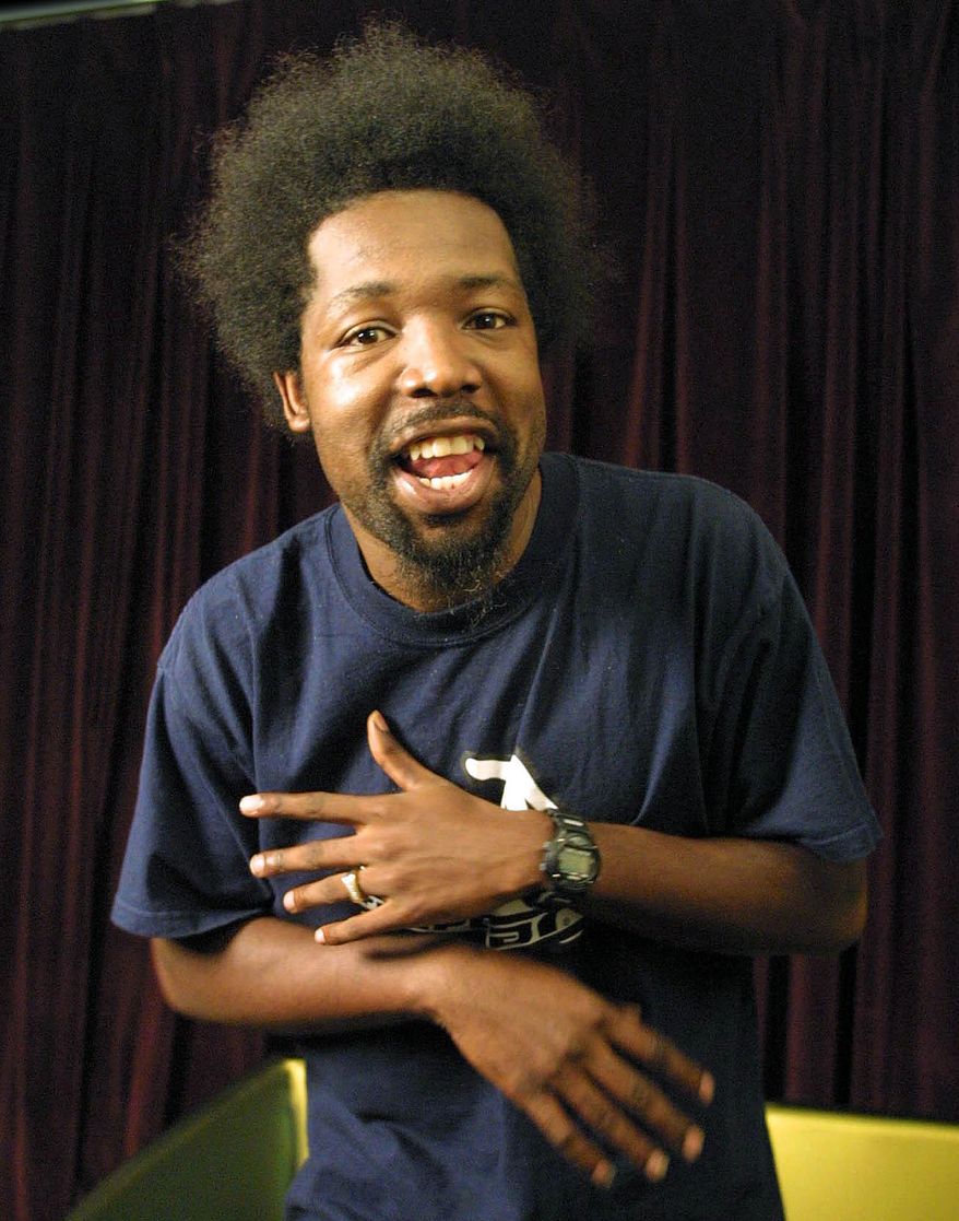 FILE - In this Aug. 22, 2001 file photo, rapper Joseph Foreman, aka Afroman, poses for a portrait in New York. Afroman, who is best known for his Grammy-nominated hit "Because I Got High," was arrested Tuesday night after punching a female fan and his show in Biloxi show was canceled. He was later released after posting $330 bond, said Biloxi Police Chief John Miller. (AP Photo/Shawn Baldwin, File)