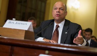 Homeland Security Secretary Jeh Johnson is ceasing preparations for a program designed to shield millions of immigrants from deportation as a result of a federal court ruling issued late Monday. Mr. Johnson said his agency will work to protect parents of U.S. citizens or legal permanent residents while the legal process continues. (Associated Press)