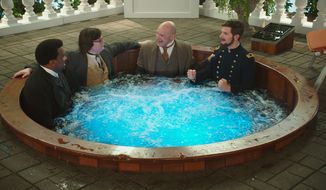 From left: Craig Robinson, Clark Duke, Rob Corddry and Adam Scott soak in some fun while filming the ludicrous sequel &quot;Hot Tub Time Machine 2.&quot; (Associated Press)