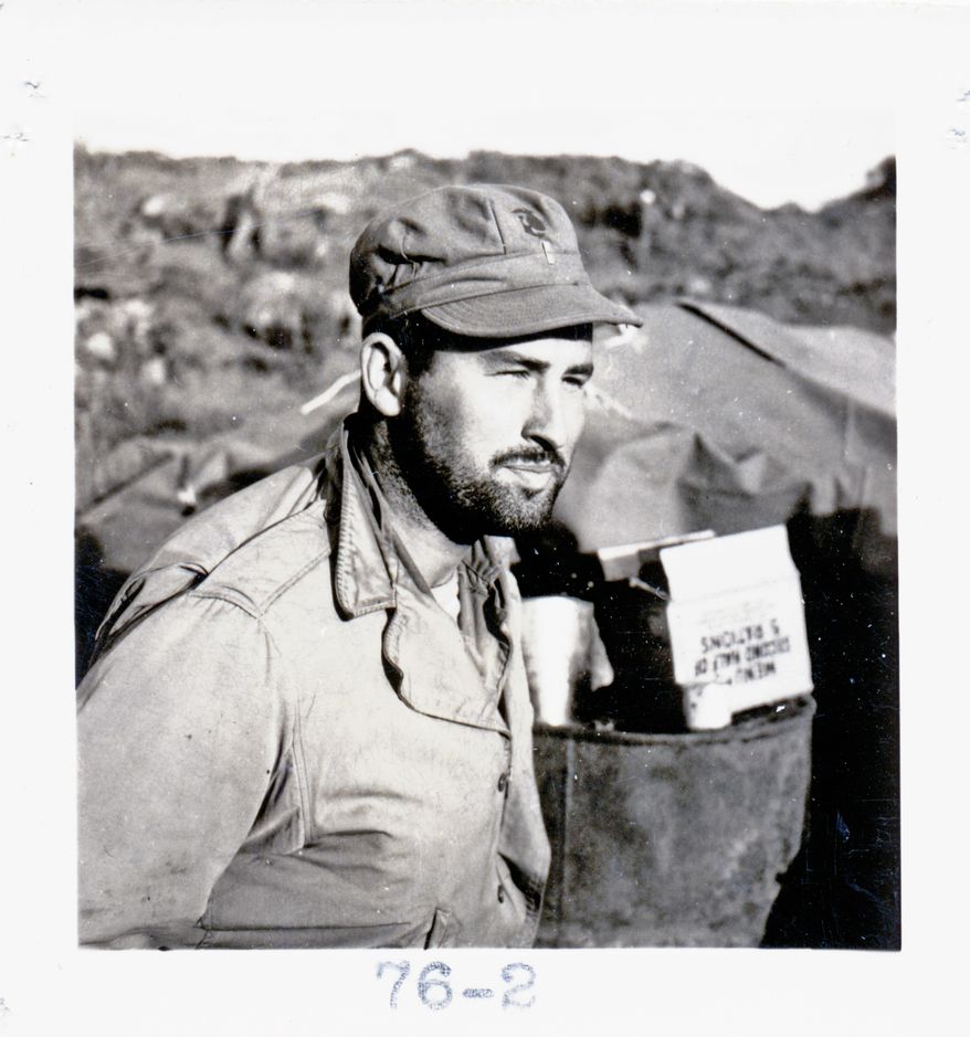 Maj. Norman Hatch, USMCR, (retired) one of the U.S. Marine Corps original combat cameramen, broke new ground in military cinematography by embedding with Marine units and filming them during combat. Maj. Norm Hatch, 5th Division, USMC, Iwo Jima, February 1945