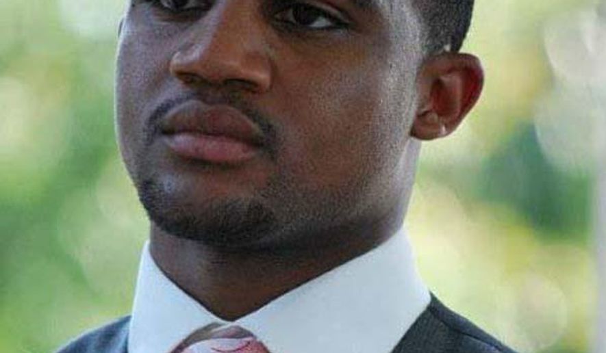 This undated handout photo provided by the Washington Metropolitan Police Department shows Omar Sykes, 22, of Northwest, Washington. Sykes was shot and killed on July 4, 2013, Rasdavid Lagarde, 27, pleaded guilty to second-degree murder Wednesday. Lagarde also pleaded guilty to attempted armed robbery and possession of a firearm during a crime of violence. (AP Photo/Washington Metropolitan Police Department)