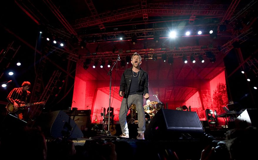 Damon Albarn, lead singer of English rock band Blur, performs during the Optimus Primavera Sound music festival in Porto, Portugal, Friday, May 31, 2013. (AP Photo/Paulo Duarte) EDITORIAL USE ONLY