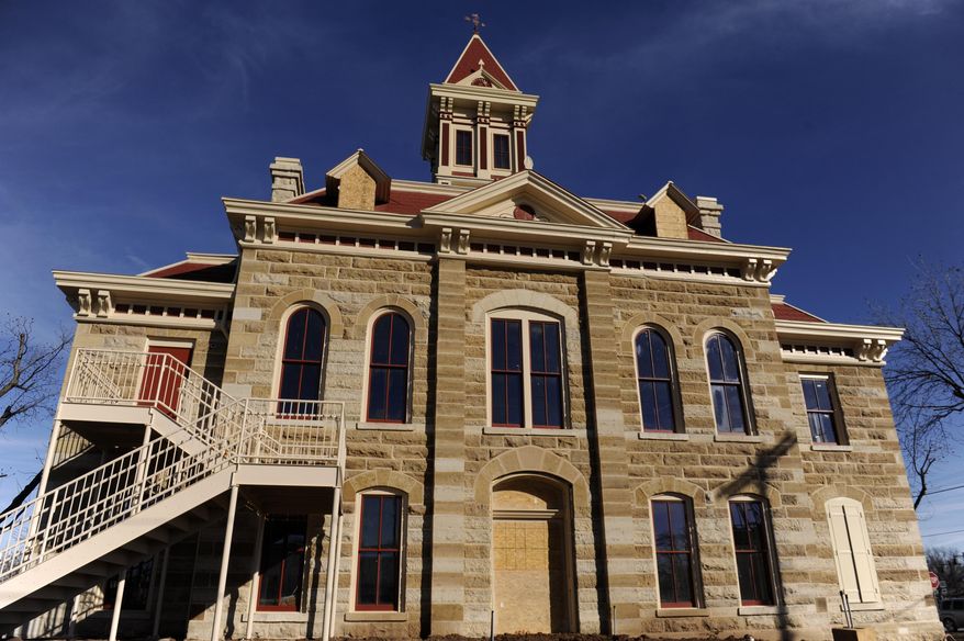 This Feb. 6, 2015 photo shows the west side of the Throckmorton County Courthouse in Throckmorton, Texas. For more than a year the 125-year-old building has undergone an extensive restoration. (AP Photo/The Abilene Reporter-News, Ronald W. Erdrich)