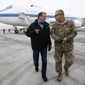 U.S. Secretary of Defense Ashton Carter, left, walks with U.S. Army Gen. John Campbell upon arrival at Hamid Karzai International Airport in Kabul, Afghanistan, Saturday, Feb. 21, 2015. Carter made his international debut Saturday with a visit to Afghanistan to see American troops and commanders, meet with Afghan leaders and assess whether U.S. withdrawal plans are too risky to Afghan security. (AP Photo/Jonathan Ernst, Pool)