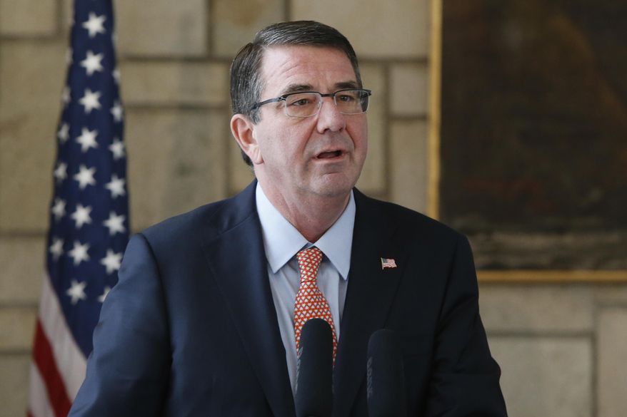 U.S. Defense Secretary Ash Carter makes remarks during a news conference with Afghan President Ashraf Ghani at the Presidential Palace in Kabul, Afghanistan, Saturday, Feb. 21, 2015. Carter made his international debut Saturday with a visit to Afghanistan to see American troops and commanders, meet with Afghan leaders and assess whether U.S. withdrawal plans are too risky to Afghan security. (SAP Photos/Jonathan Ernst, Pool)