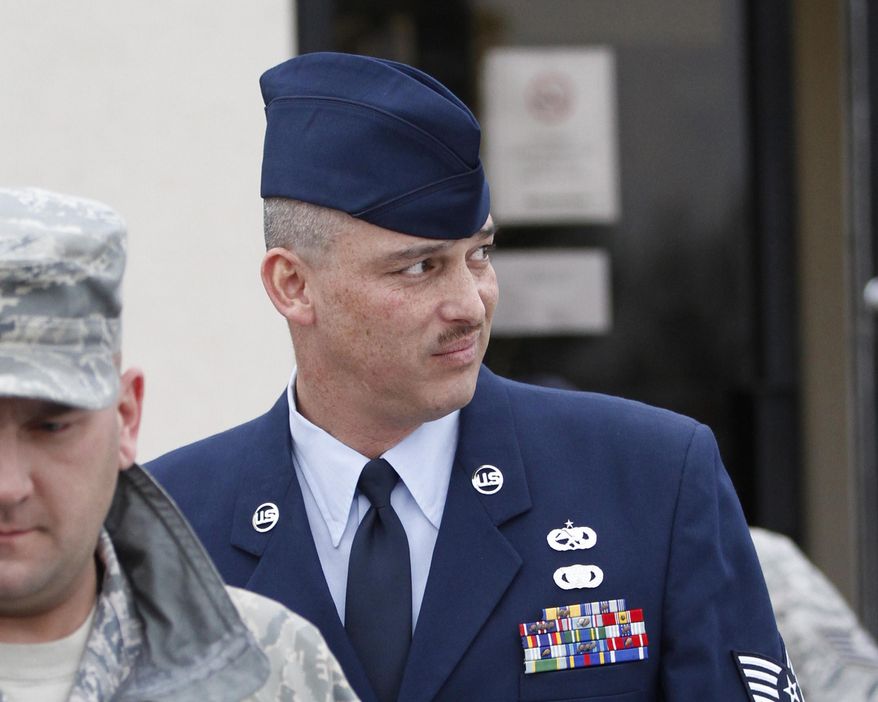 FILE - In this Jan. 19, 2011 file photo is Air Force Sgt. David Gutierrez, right, at McConnell Air Force Base in Wichita, Kan. The attorney for the Kansas airman says a ruling on Monday, Feb. 23, 2015 by the nation&#39;s highest military court that reversed his client&#39;s conviction for exposing multiple sex partners to HIV will effectively end such prosecutions in the armed forces. (AP Photo/Jeff Tuttle, File)