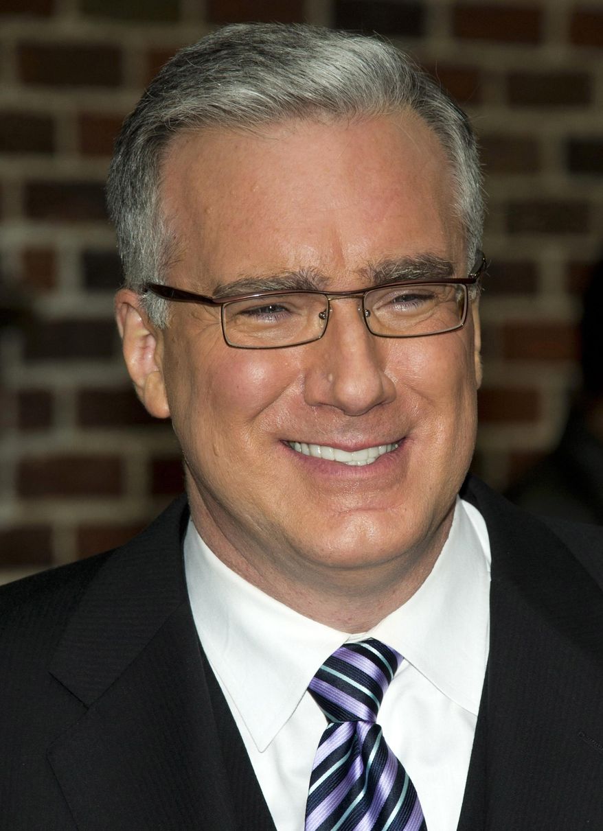 FILE - In this Oct. 24, 2011 file photo, Keith Olbermann leaves a taping of the &amp;quot;Late Show with David Letterman,&amp;quot; in New York. Olbermann was taken off his ESPN show for the rest of the week after making insulting comments about Penn State students on Twitter Monday, Feb. 23, 2015. (AP Photo/Charles Sykes, file)