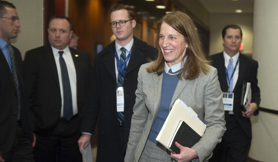 Health and Human Services Secretary Sylvia Mathews Burwell departs a governors only luncheon after giving an address during the  National Governors Association Winter Meeting in Washington on Feb. 22, 2015. (Associated Press) **FILE**