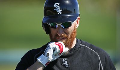 Chicago White Sox&#x27;s Adam LaRoche participates in batting practice during a spring training baseball workout Tuesday, Feb. 24, 2015, in Phoenix. (AP Photo/John Locher)