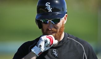 Chicago White Sox&#x27;s Adam LaRoche participates in batting practice during a spring training baseball workout Tuesday, Feb. 24, 2015, in Phoenix. (AP Photo/John Locher)