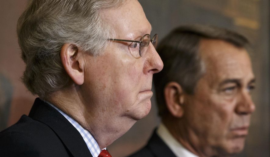 Senate Majority Leader Mitch McConnell, R-Ky., left, and Speaker of the House John Boehner, R-Ohio, stand together Feb, 13, 2015, at a ceremony before the signing of the bill authorizing expansion of the Keystone XL pipeline, at the Capitol in Washington. (Associated Press) **FILE**