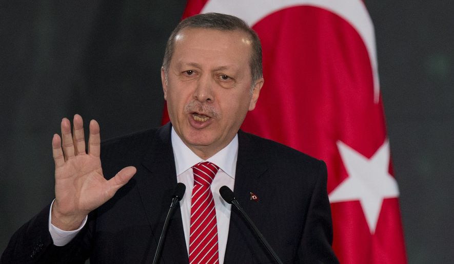 Turkish President Recep Tayyip Erdogan is pushing a bill that would allow for arbitrary searches and detentions without charges. (Associated Press)