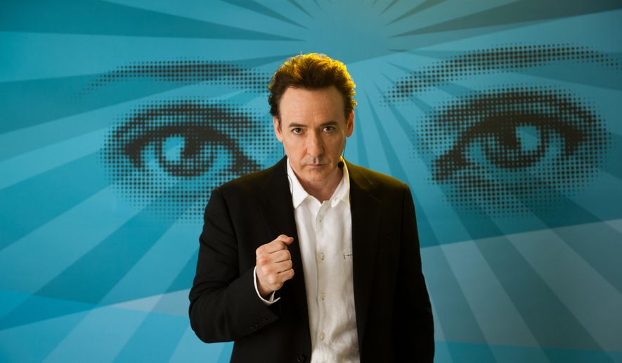 John Cusack appears in a scene from &quot;Maps to the Stars.&quot; (AP Photo/Focus World, Caitlin Cronenberg)  ** FILE **