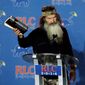 Duck Dynasty&quot; patriarch Phil Robertson will receive the &quot;Andrew Breitbart Defender of the First Amendment Award&quot; at the Conservative Political Action Conference Friday. (Associated Press photographs)