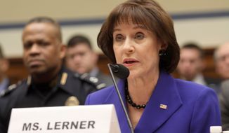 Former Internal Revenue Service official Lois Lerner testifies March 5, 2014, on Capitol Hill in Washington. Investigators said Thursday, Feb. 26, 2015, they have recovered 32,000 emails related to the former IRS official at the heart of the agency’s tea party scandal. But they don’t know how many of them are new. (Associated Press) **FILE**