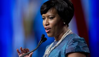 D.C. Mayor Muriel Bowser speaks Jan. 2, 2015, after taking the oath of office at the District of Columbia Mayoral Inauguration ceremony at the Convention Center in Washington. (Associated Press) **FILE**