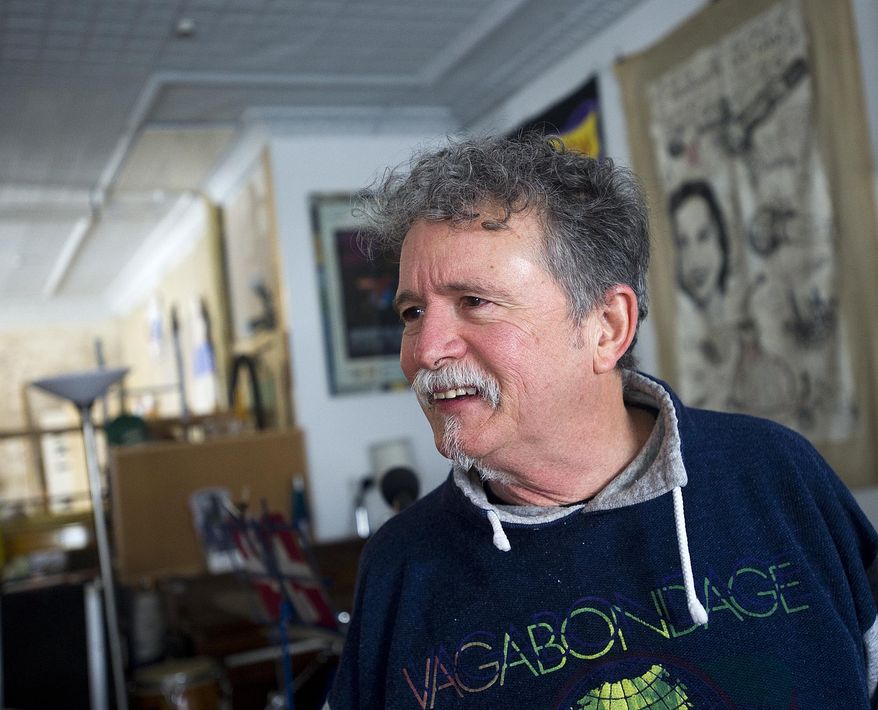 ADVANCE FOR USE MONDAY, MARCH 2 - in this photo taken Friday, Feb. 20, 2015, performance artist Billy X. Curmano, who has swam the entire length of the Mississippi River, been buried alive for three days and is now preparing for a 24-hour nap on a bed of nails, is seen at his home in Witoka, Minn. (AP Photo/Winona Daily News, Andrew Link)