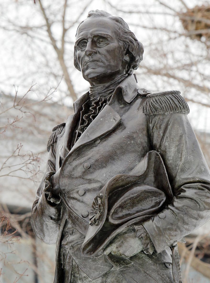 A statue of Gen. John Stark is seen on the Statehouse lawn Thursday Feb. 26, 2015 in Concord, N.H. Stark’s Live Free or Die quote grace New Hampshire’s license plates, but few outside of New England know who the revolutionary war hero is. Two brothers hope to enlighten readers with their new book on the Granite State’s favorite son, who did most of his soldiering in New York. (AP Photo/Jim Cole)