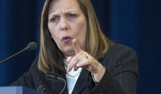 Josefina Vidal, Director General of the U.S. division at Cuba&#39;s Foreign Ministry, gestures as she speaks with the media at the State Department in Washington, Friday, Feb. 27, 2015. The United States and Cuba claimed progress Friday toward ending a half-century diplomatic freeze, suggesting they could clear some of the biggest obstacles to their new relationship within weeks.  (AP Photo/Cliff Owen)