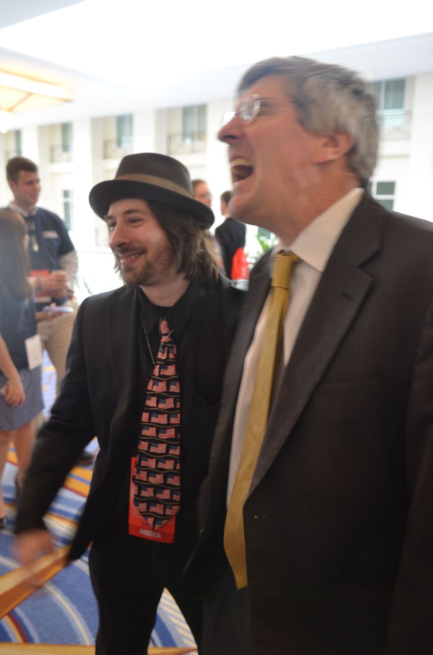 Blogger Eric Golub and Stephen Moore of the Heritage Foundation share a laugh (Photo by Judson Phillips)