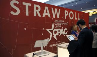 Attendees vote in the CPAC 2015 Straw Poll at the Conservative Political Action Conference (CPAC) in Friday, Feb. 27, 2015, in National Harbor, Md. (AP Photo/Alex Brandon)