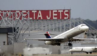 A Delta Airlines jet departs Hartsfield Jackson Atlanta International Airport in Atlanta on April 14, 2008. (Associated Press) **FILE**
