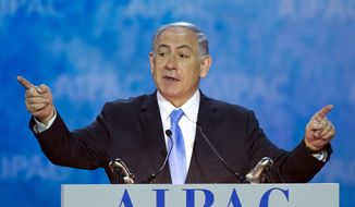 Israeli Prime Minister Benjamin Netanyahu gestures while speaking at the 2015 American Israel Public Affairs Committee (AIPAC) Policy Conference in Washington, Monday, March 2, 2015. (AP Photo/Cliff Owen)