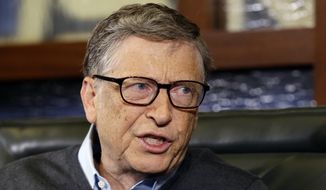 In this May 5, 2014, file photo, Microsoft co-founder and Berkshire Hathaway board member Bill Gates speaks during an interview with Liz Claman on the Fox Business Network in Omaha, Neb. (AP Photo/Nati Harnik, File)