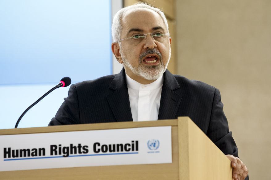 Iranian Foreign Minister Mohammad Javad Zarif delivers a speech during a session of the Human Rights Council, at the European headquarters of the United Nations, in Geneva, Switzerland, Monday, March 2, 2015. (AP Photo/Keystone,Salvatore Di Nolfi)