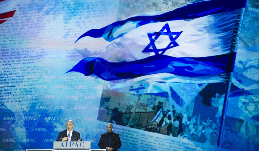 Israeli Prime Minister Benjamin Netanyahu, flanked by one of his security guards, addresses the 2015 American Israel Public Affairs Committee (AIPAC) Policy Conference in Washington, Monday, March 2, 2015. (AP Photo/Cliff Owen)