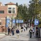In this Thursday, Feb. 26, 2015, file photo, students walk on the UCLA campus in Los Angeles. (AP Photo/Damian Dovarganes) ** FILE **
