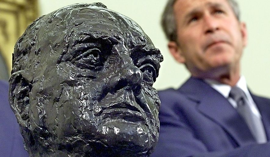 WASHINGTON, UNITED STATES:  US President George W. Bush listens to journalists&#39; questions after receiving a bust of Sir. Winston Churchill from the British Ambassador at the Oval Office of the White House in Washington, DC 16 July 2001.     AFP PHOTO/TIM SLOAN (Photo credit should read TIM SLOAN/AFP/Getty Images)